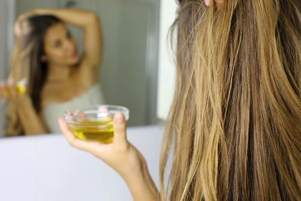 Chăm sóc tóc bằng dầu dừa là liệu pháp vô cùng lành tính